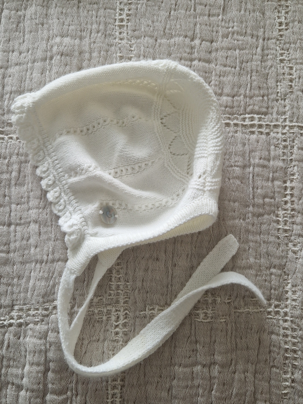 Soft White Knit Baby Bonnet with Scallop Trim